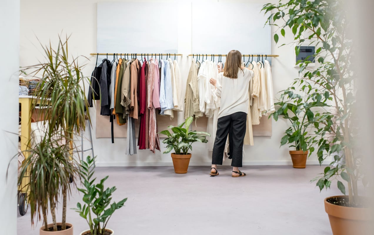 woman shopping at a clothing retail store