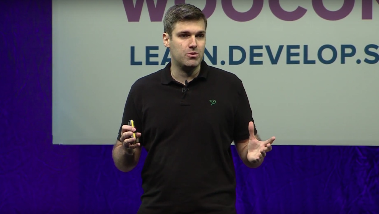 Brent Shepherd on stage at WooConf 2016.